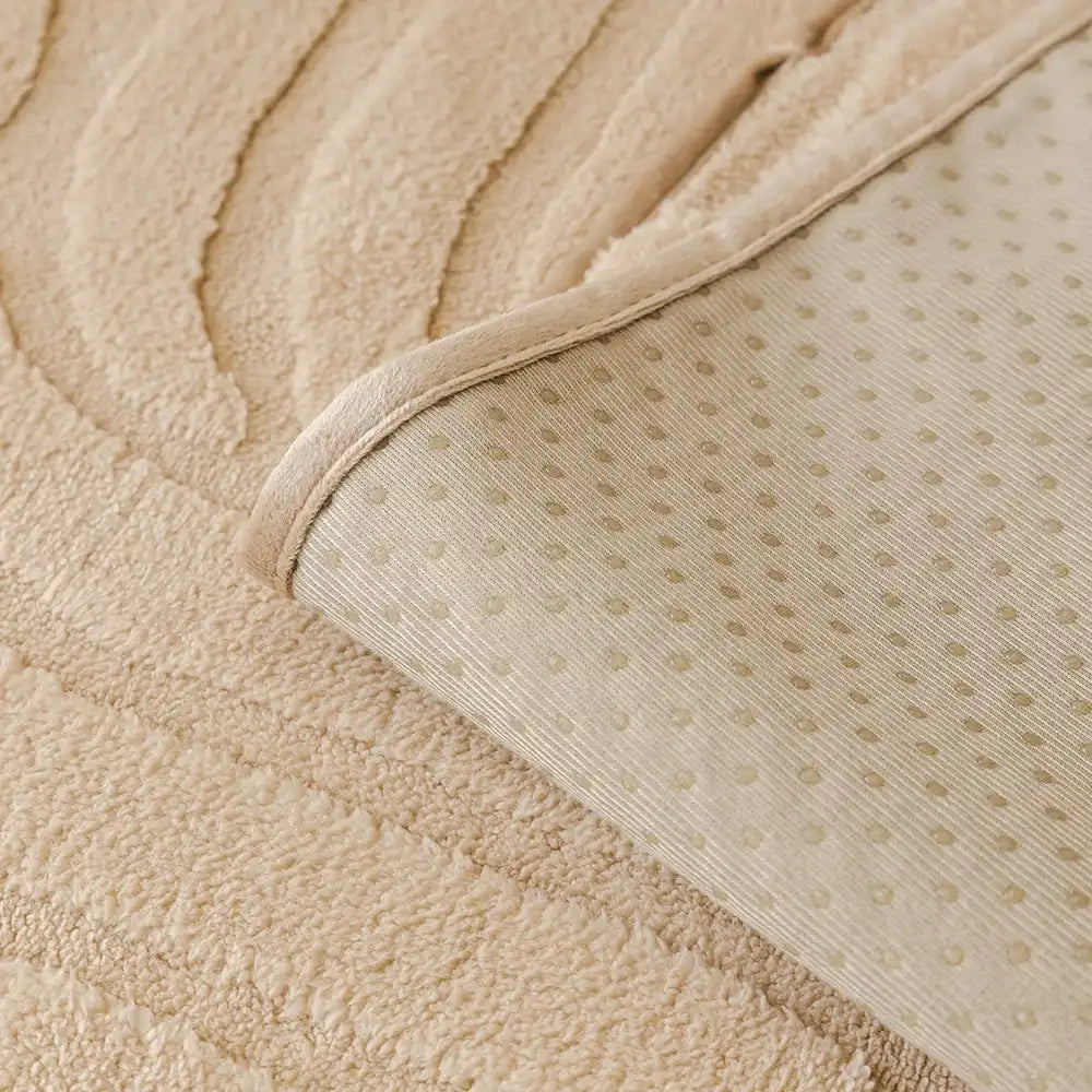 Anti-slip backing of plush sofa cushion protector