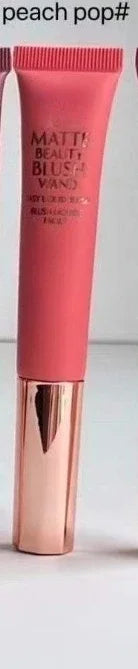 Peach Pop shade of NEW MAKE UP TOOL MAKE UP blusher beauty blush featuring a matte finish tube with rose gold cap and soft sponge applicator.
