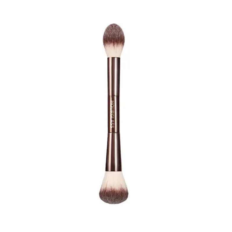 Isolated image of the dual-ended makeup brush with soft nylon bristles and elegant metal handle for professional makeup application.