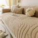 Plush Sofa Cushion Protector on a living room sofa