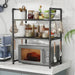 Multi-layer kitchen storage rack with microwave shelf and condiment organizer, ideal for countertop tidying and kitchen accessories display.