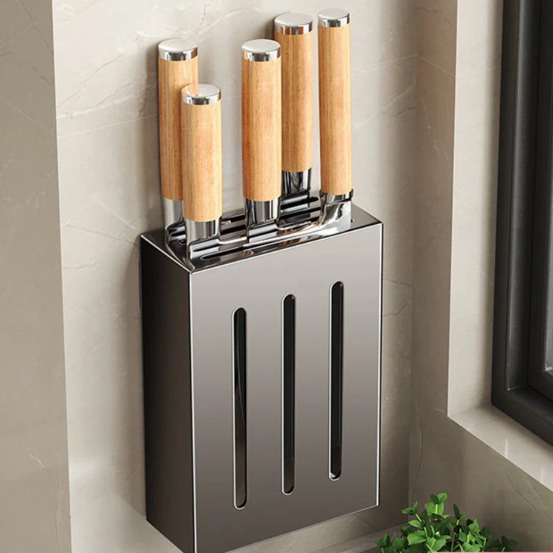 Wall-mounted knife storage box with wooden-handled knives in kitchen