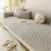 Gray plush sofa cushion protector on a contemporary couch