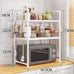 White 3-tier microwave shelf kitchen storage rack with condiment organizer, 73cm tall, includes hanging hooks and multi-layered space.