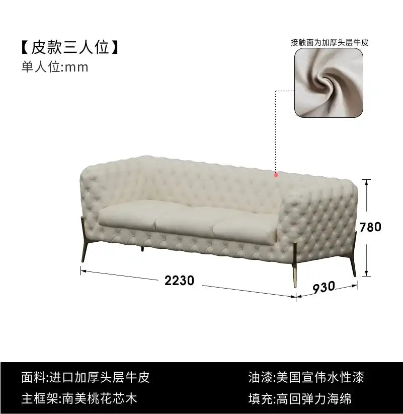 Modern Luxury Leather Sofa with tufted design, gold legs, and plush pillows