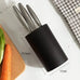 Compact 17.5cm tall and 11cm wide black knife block holder for chef's knives, perfect for space-saving kitchen organization.