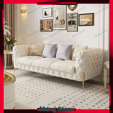 Modern Luxury Leather Sofa in a stylish living room setting with decorative pillows.