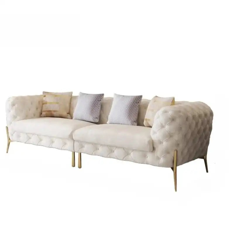 Modern Luxury Leather Sofa with tufted design, gold legs, and plush pillows