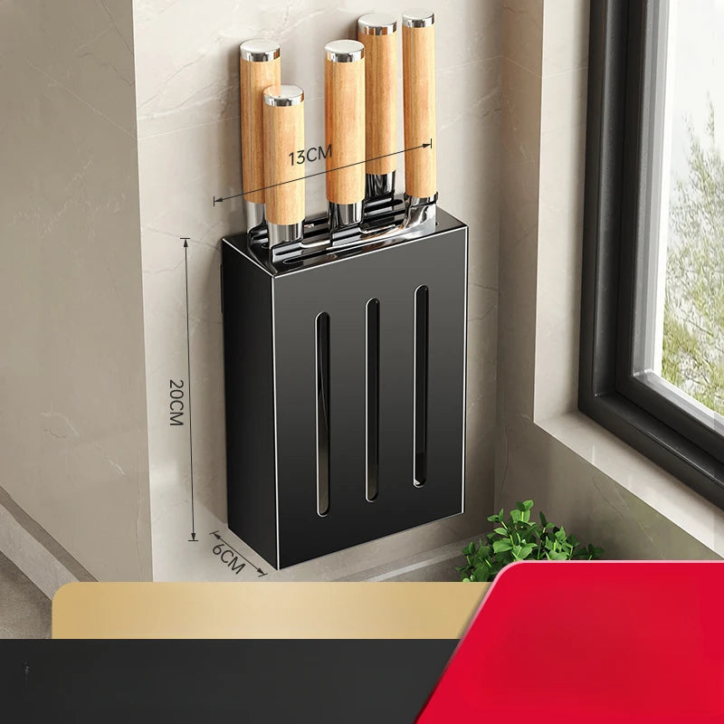 Wall-mounted black knife storage box with wooden-handled knives in kitchen