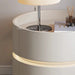 Modern bedroom nightstand with built-in LED lighting and a table lamp