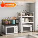 Multi-layer kitchen storage rack with microwave shelf and condiment organizer, ideal for countertop tidying and kitchen accessories display.