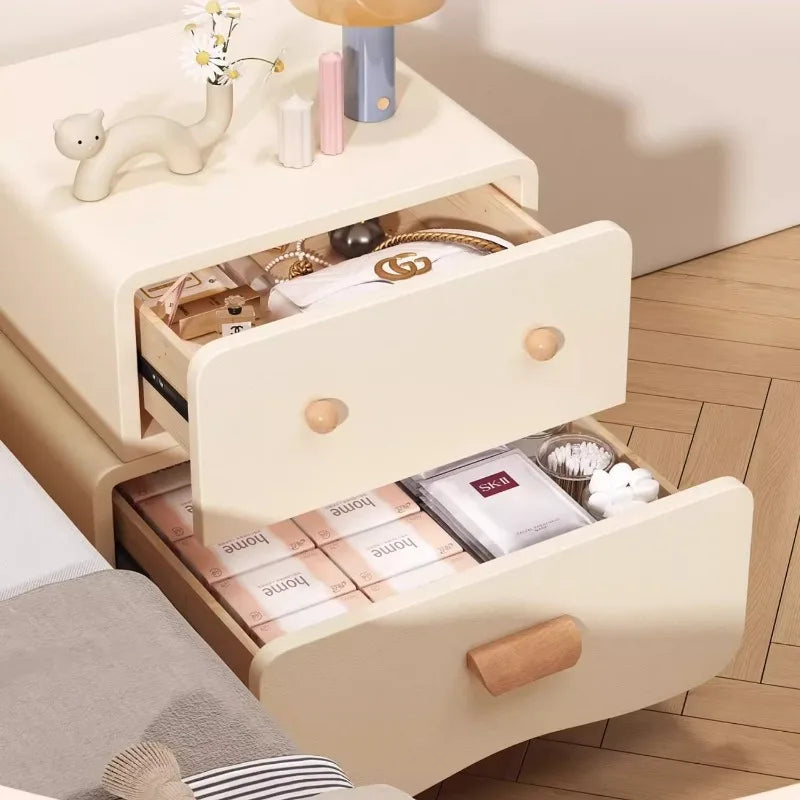 Open drawers of children's storage cabinet
