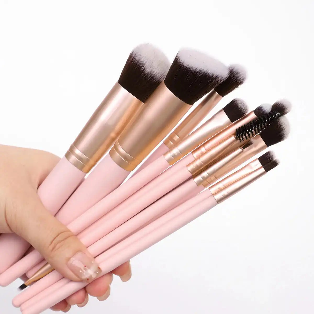 25 Professional Makeup Tools Set with pink brushes, sponges, powder puffs, eyebrow trimmer, and storage bag